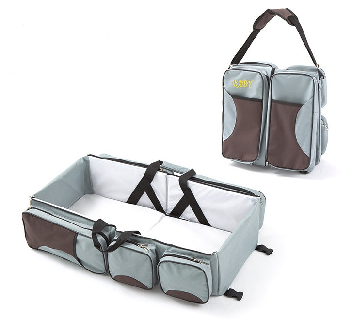 Wickeltasche mit faltbarem Babybett
