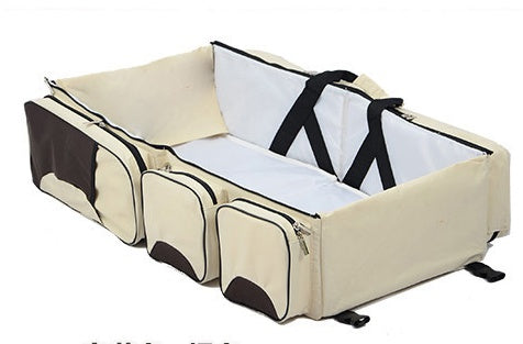 Wickeltasche mit faltbarem Babybett