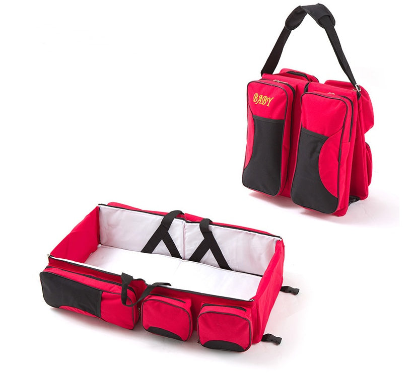 Wickeltasche mit faltbarem Babybett