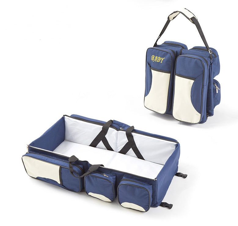 Wickeltasche mit faltbarem Babybett