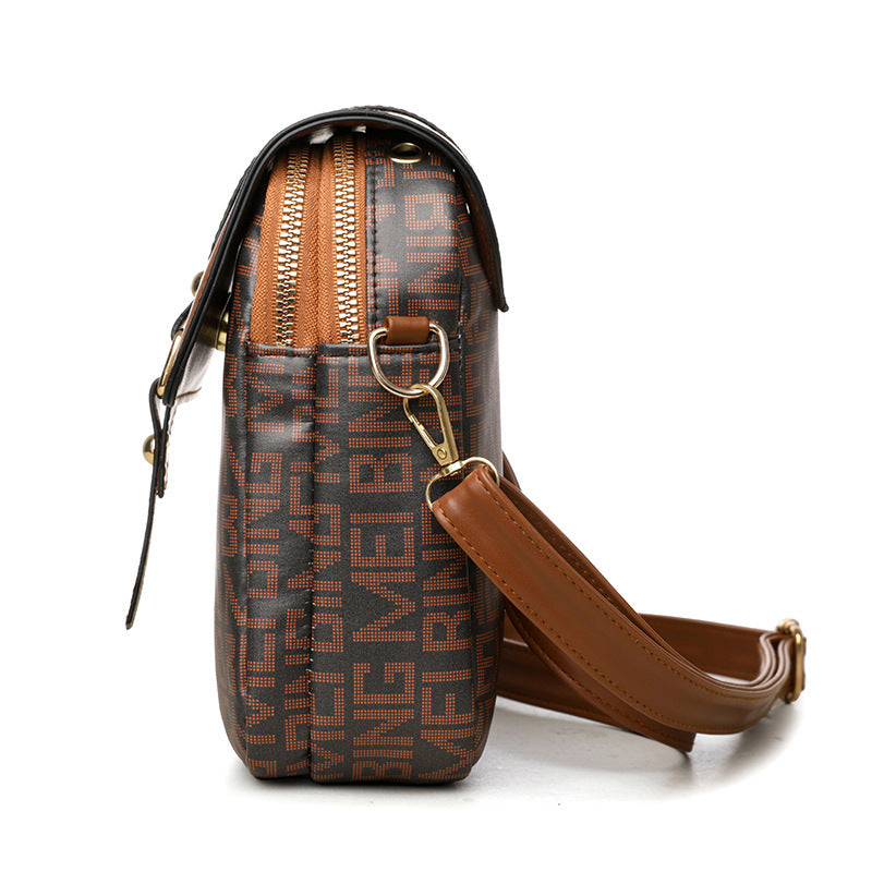 Mini-Umhängetasche aus weichem Leder mit Retro-Print