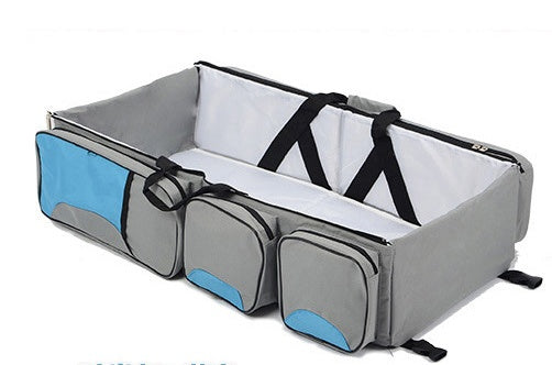 Wickeltasche mit faltbarem Babybett