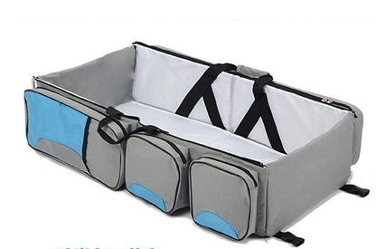 Wickeltasche mit faltbarem Babybett