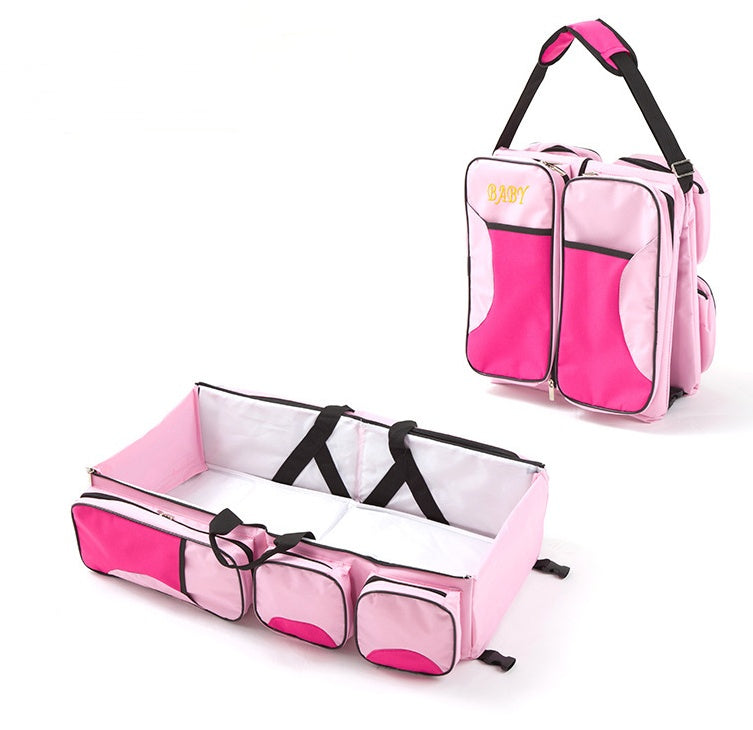 Wickeltasche mit faltbarem Babybett