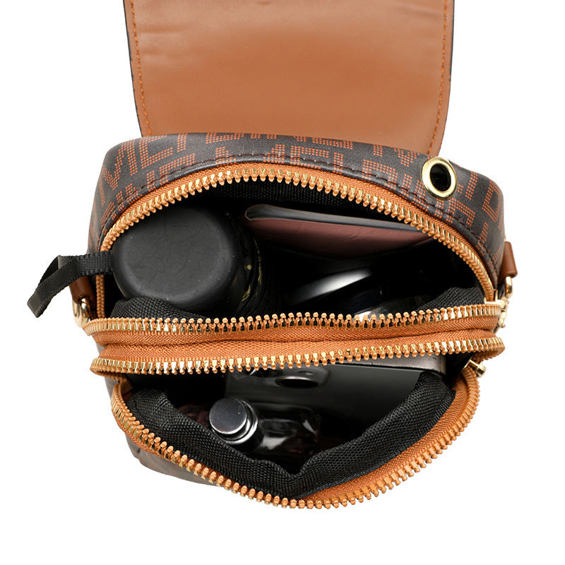 Mini-Umhängetasche aus weichem Leder mit Retro-Print