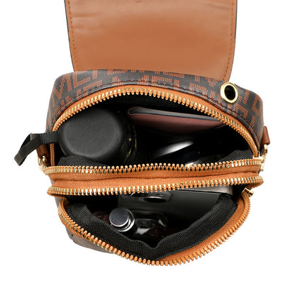 Mini-Umhängetasche aus weichem Leder mit Retro-Print